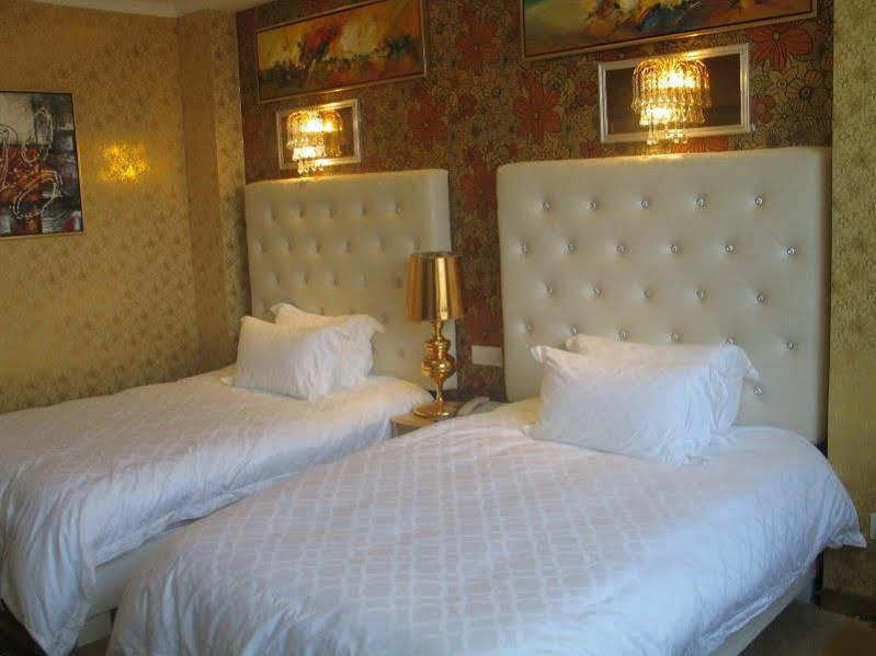 Kapok Hotel Csuhaj Kültér fotó